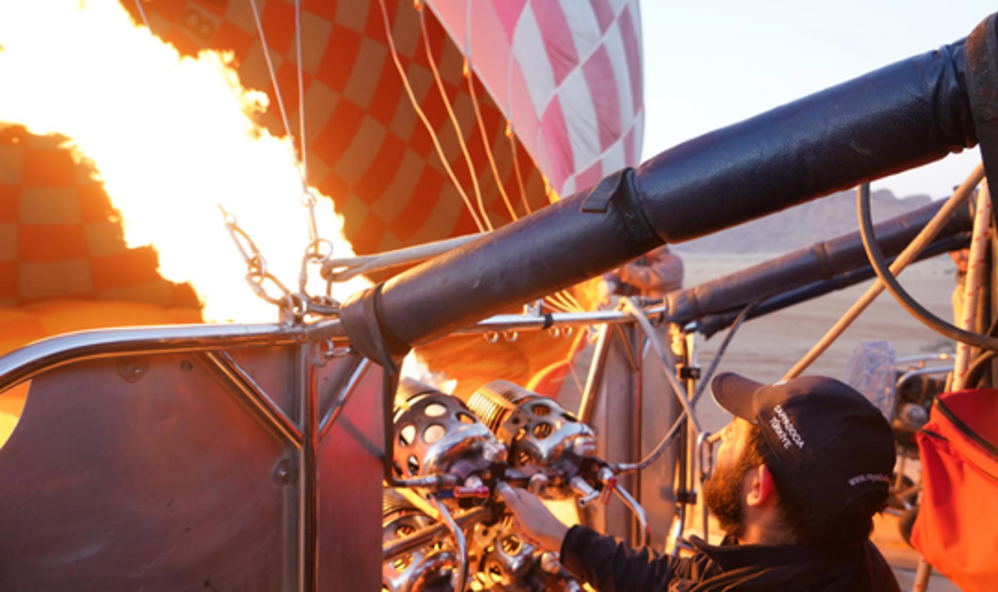 Preparing for Lift-off: Hot Air Balloon Ignition in Wadi Rum